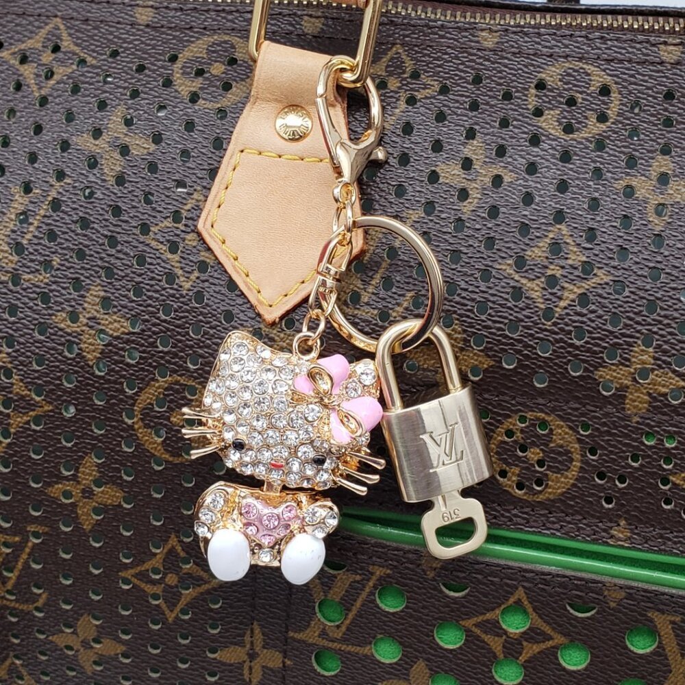 Louis Vuitton Gold Lock 🔒 Authentic LV Key + Unbranded Hello Kitty Bag Charm - Picture 8 of 8